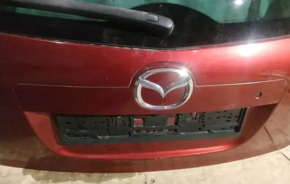 Mazda CX-7 Trunk door license plate light bar 