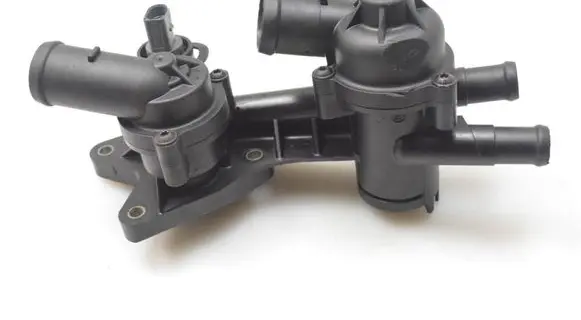 Thermostat/thermostat housing