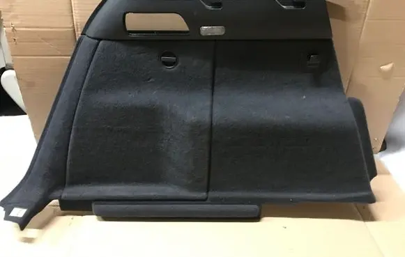 Trunk/boot lower side trim panel