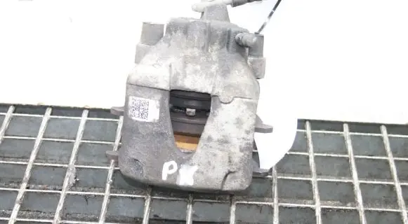 Volkswagen Polo VI Front brake caliper