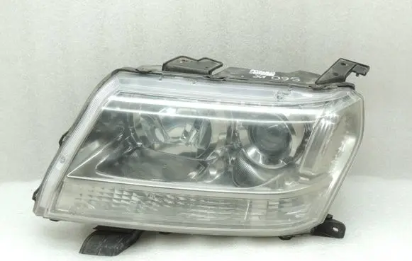 Suzuki Grand Vitara II Headlight/headlamp 3532065J11 3532065J21 35320-65J21