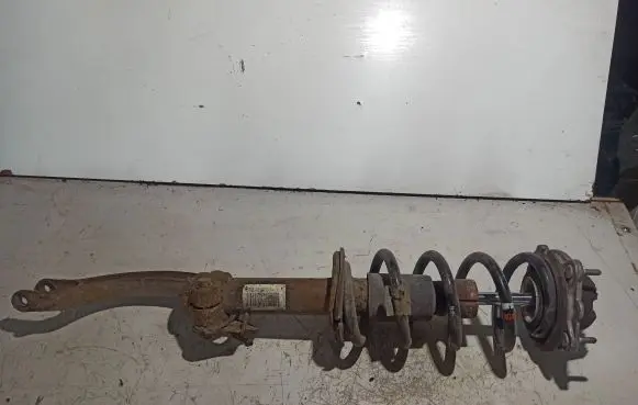 Front shock absorber with coil spring