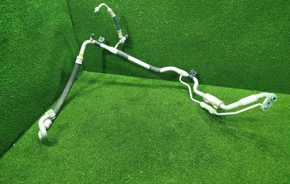 KIA Ceed Air conditioning (A/C) pipe/hose 97775J7300