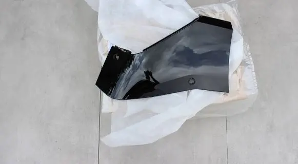 Rear bumper trim bar molding