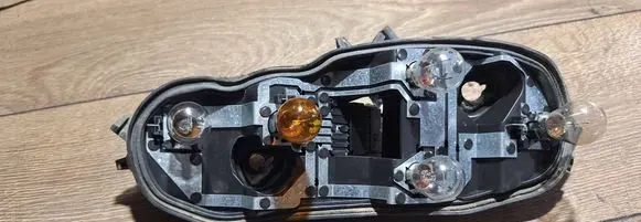 Opel Corsa D Tail light bulb cover holder 89037852