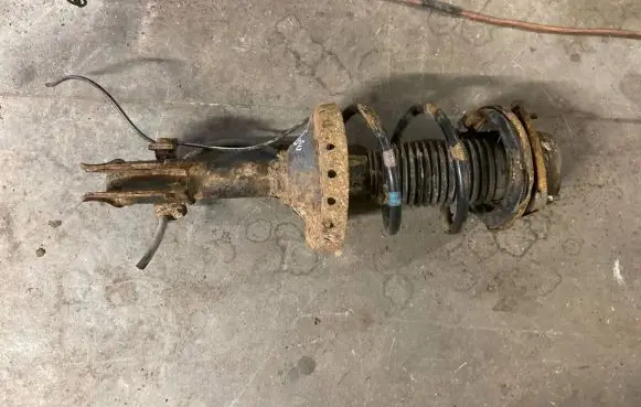 Subaru Justy Rear shock absorber with coil spring 