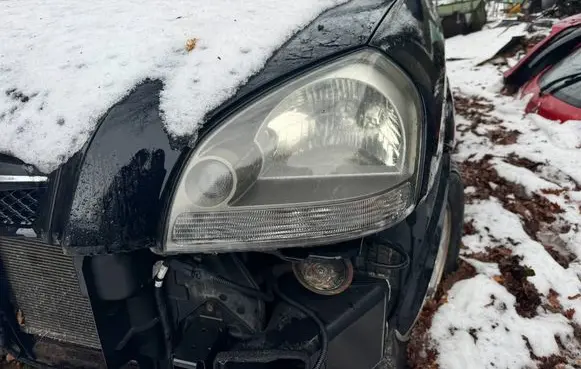 Hyundai Tucson JM Headlight/headlamp 921012EXXX