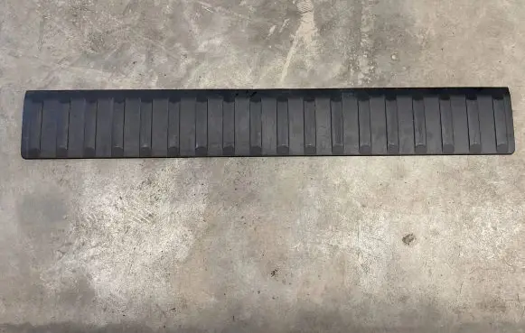 Trunk/boot lower side trim panel