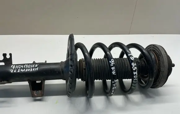 Volkswagen Transporter - Caravelle T5 Front shock absorber/damper 7H0413031N 7E5413031H
