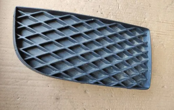 Mazda Premacy Front bumper lower grill C14550C11