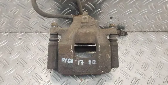 Toyota Aygo AB40 Front brake caliper 