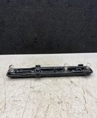 Tail light bulb cover holder