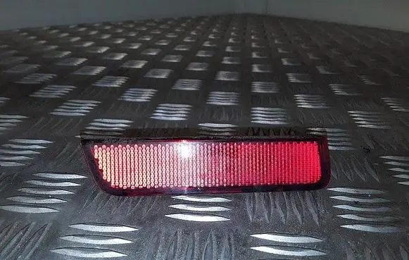 Rear tail light reflector