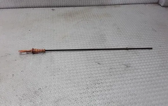 Oil level dip stick