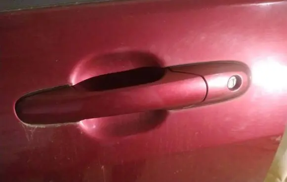 Suzuki Liana Front door exterior handle