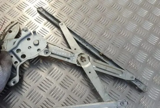 Suzuki Swift I Sliding door window regulator with motor