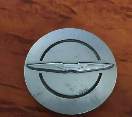 Chrysler Voyager Original wheel cap 1LB74TRMAB