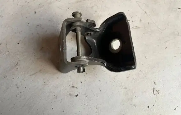 Rear door upper hinge