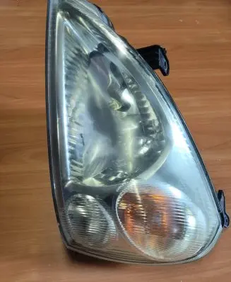 Suzuki Liana Headlight/headlamp 10032662