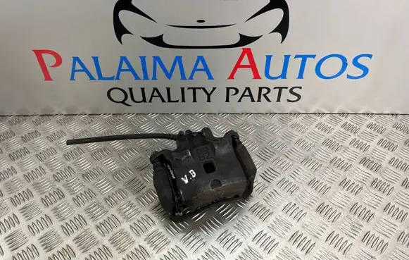 Nissan Juke I F15 Front brake caliper 