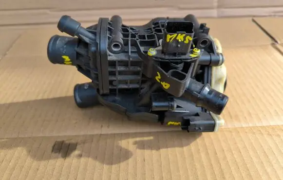 Thermostat/thermostat housing