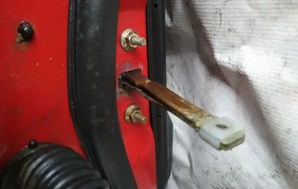 Mazda 323 F Front door check strap stopper 