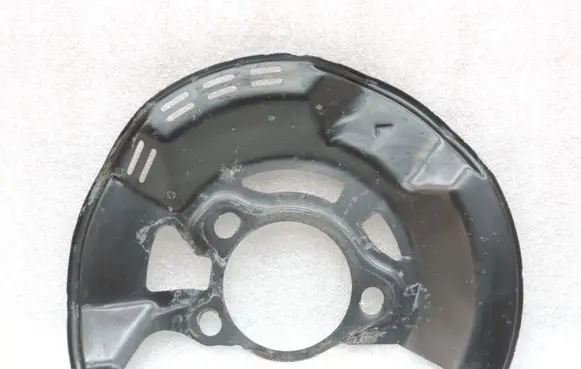 Toyota Yaris XP210 Front brake disc dust cover plate 47782K0030