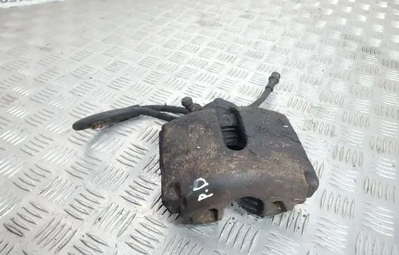 Volkswagen PASSAT B7 Front brake caliper