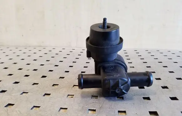 Coolant heater control valve