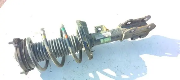 Front shock absorber with coil spring