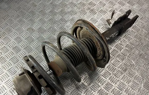 Chrysler Voyager Front shock absorber with coil spring