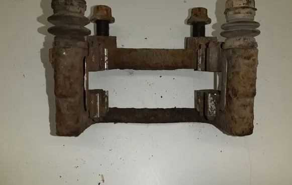 Opel Astra G Brake caliper pad carrier rear 