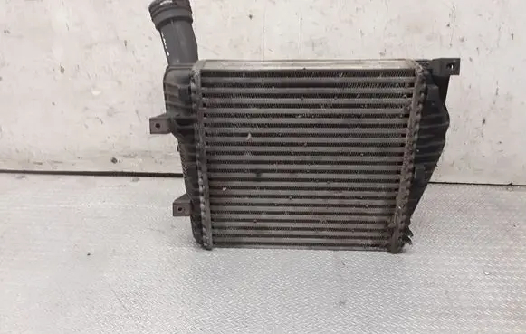 Volkswagen Touareg I Intercooler radiator 