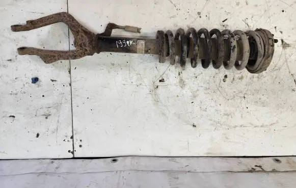 Front shock absorber with coil spring