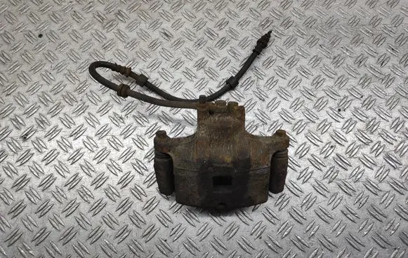 Mitsubishi Lancer VIII Front brake caliper 