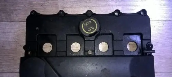 Rocker cam cover
