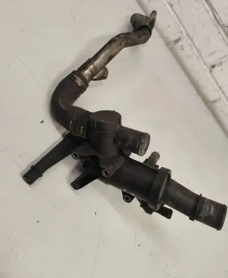 Thermostat/thermostat housing
