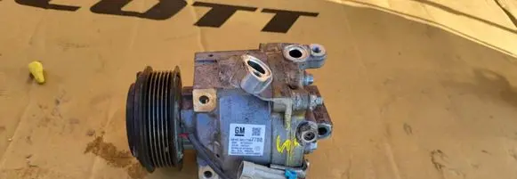 Opel Adam Air conditioning (A/C) compressor (pump) 94517788 AKT011H403AT 0022341