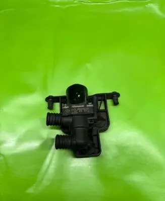 Coolant heater control valve