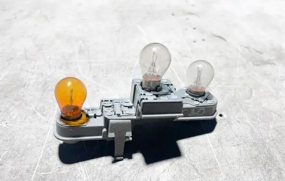 Volvo C30 Tail light bulb cover holder 27712104