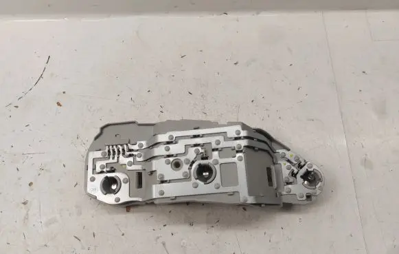 Tail light bulb cover holder