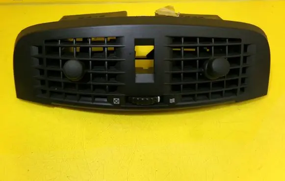 Cadillac CTS Dash center air vent grill 25703804