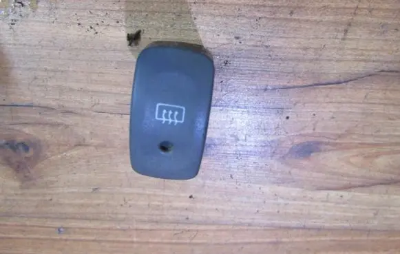 Nissan Micra Windscreen/window heater switch 065251