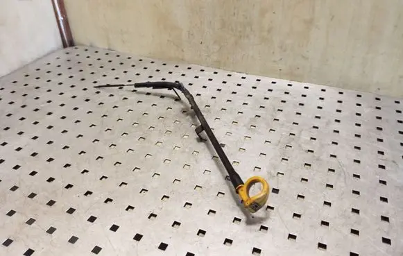 Oil level dip stick