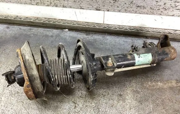 Mercedes-Benz C W203 Front shock absorber with coil spring 824904553432 A2033201939