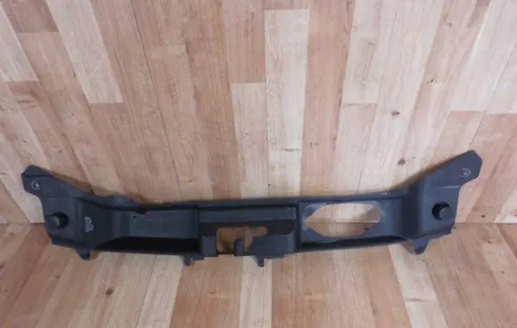 Engine bonnet/hood lock trim molding
