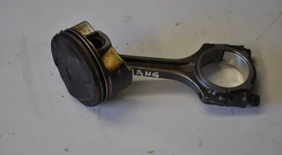 Piston with connecting rod