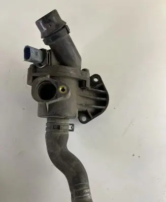 Thermostat/thermostat housing
