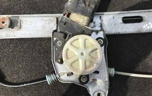 Mazda 626 Front door window regulator motor 