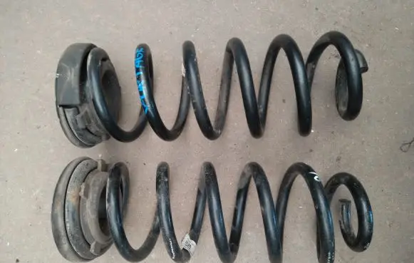 KIA Sportage Rear coil spring 55350F1C80